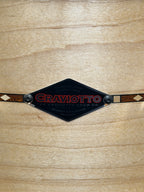 Craviotto brand nameplate on a wooden surface