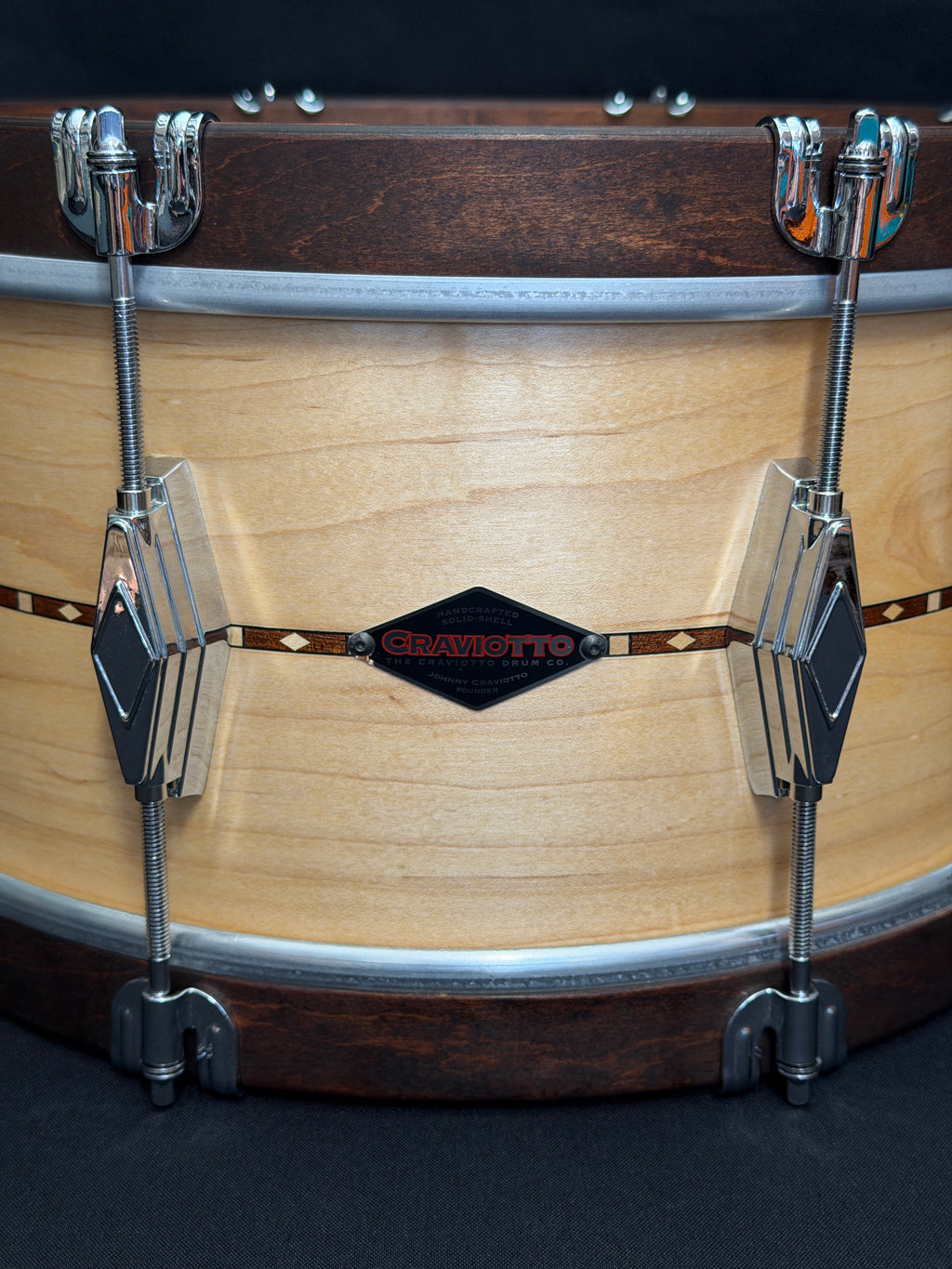 Close-up of a drum with a brand logo on the head