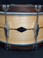 Close-up of a drum with a brand logo on the head