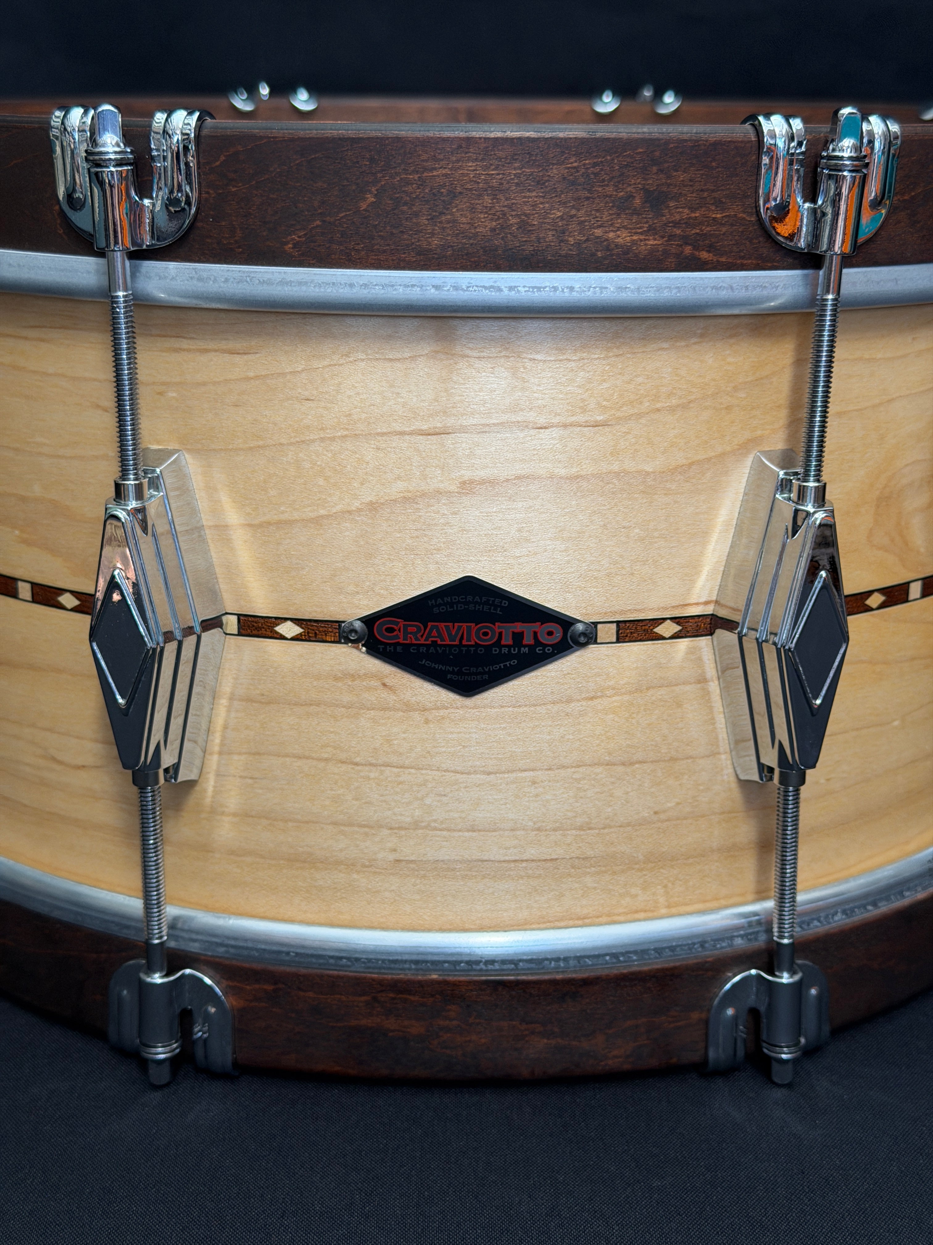 Close-up of a drum with a brand logo on the head